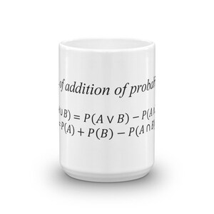 May include: A white ceramic mug featuring black printed text that reads rule of addition of probability, followed by the mathematical formula P(A U B) = P(A v B) - P(A) and P(A) + P(B) - P(A ∩ B) displayed clearly on the front surface of the mug.