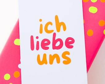 Tarjeta postal “Nos amo” (Neón) – Tarjeta de felicitación romántica hecha de papel reciclado DIN A6