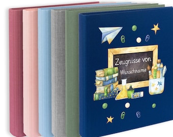 May include: A collection of colorful, hardcover notebooks. The notebooks are in shades of pink, blue, green, and navy. The front of the navy and beige notebooks feature a chalkboard design with the text "Zeugnisse von Wunschname" and illustrations of books, pencils, and a paper airplane.