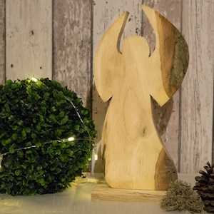 Angel made of oak wood decoration oak tree edge