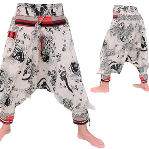 May include: White, black, and red patterned pants with a drawstring waist and a koi fish design. The pants have a wide leg and a loose fit.