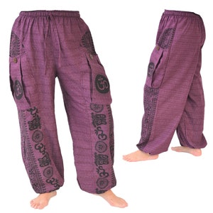 May include: Purple pants with black printed designs, including the Om symbol, on the legs and pockets.