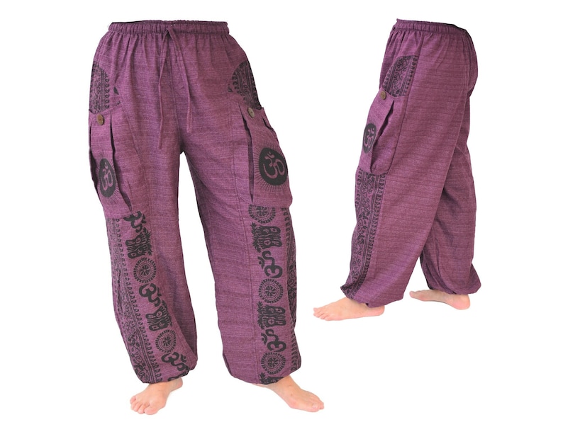 May include: Purple pants with black printed designs, including the Om symbol, on the legs and pockets.