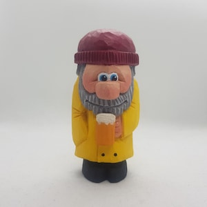Fisherman MIke with beer handcarved and hand painted figure