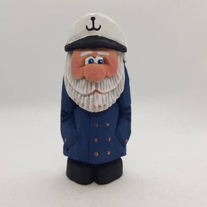 Figura do Capitão Cod esculpida e pintada à mão