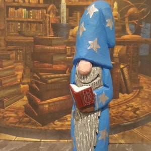 Hand Carved And hand painted wooden wizard with spell book
