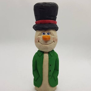 Hand carved and hand painted snowman