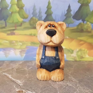 Hand carved and hand painted little dungaree bear