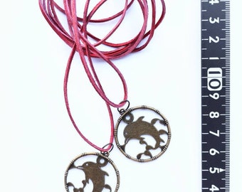 Dolphin Pendant: Bronze Medallion with Red Leather Cord