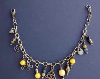 Celtic Charm Bracelet: Bronze Chain with Yellow Gems