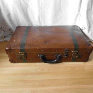 large old suitcase from the 60s, vintage, brown suitcase