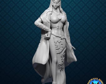 May include: A grey 3D-printed figurine of a female fantasy character. She is dressed in a long gown, cape, and elaborate headwear. The figure has detailed features and is posed with one hand on her hip. The text "patreon.com/irnkman" is visible.