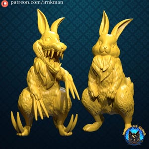 May include: Two yellow rabbit figurines. One rabbit has a menacing open mouth with sharp teeth and claws. The other rabbit is in a similar pose, but with a more benign expression. The figurines are detailed and have a textured fur appearance.