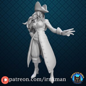 May include: A white painted miniature figurine of a female pirate wearing a long coat, a hat, and boots. The figurine is posed with one hand on her hip and the other extended outward.
