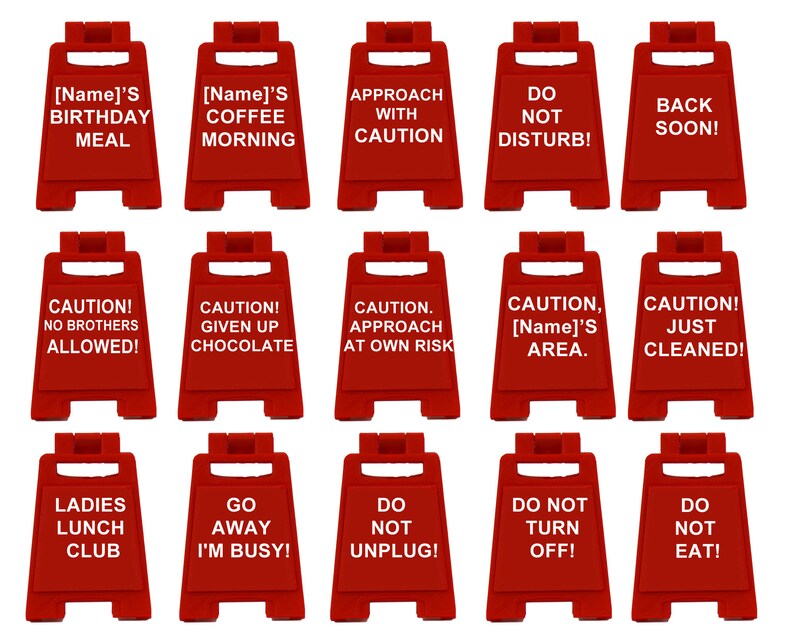 May include: A collection of red A-frame signs with white text. The signs display various messages, including "Birthday Meal," "Coffee Morning," "Approach with Caution," and "Do Not Disturb!" Other signs read "Back Soon!" and "Just Cleaned!"