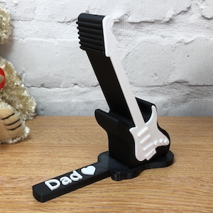 Soporte para teléfono con forma de guitarra. Soporte para teléfono con forma de guitarra - Regalos para teléfono - Pequeños detalles - Regalo musical - Regalo para guitarristas imagen 1