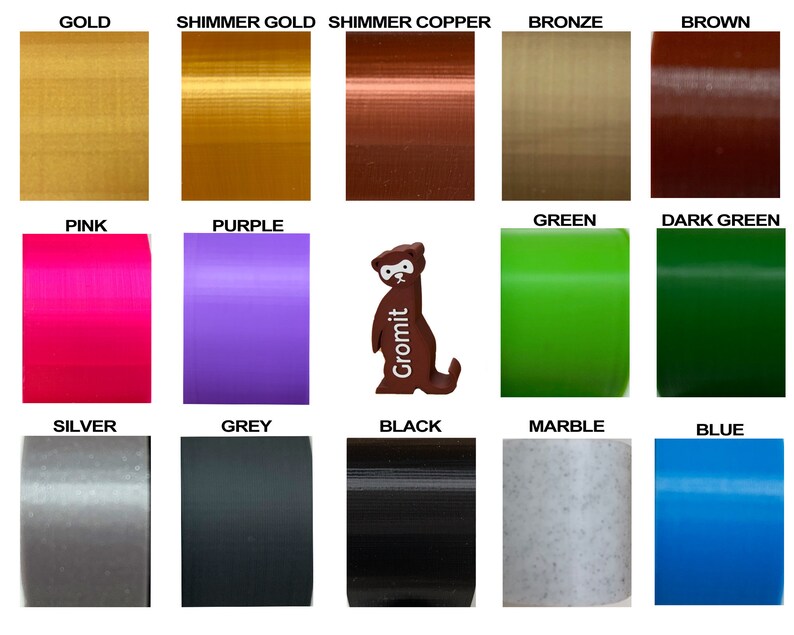 May include: A chart of 15 different colors of filament for 3D printing. The colors include gold, shimmer gold, shimmer copper, bronze, brown, pink, purple, green, dark green, silver, grey, black, marble, and blue.