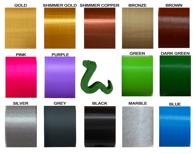 May include: A chart of 15 different colors of filament for 3D printing. The colors include gold, shimmer gold, shimmer copper, bronze, brown, pink, purple, green, dark green, silver, grey, black, marble, and blue.