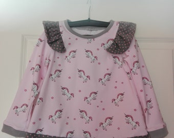 Girls dress tunic with unicorns in size 92