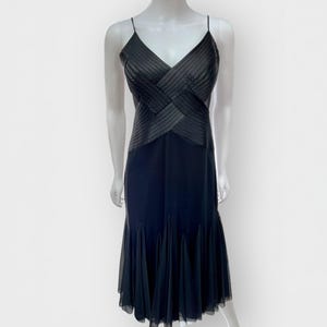 May include: A set of three ceramic mugs with a speckled, matte finish. The mugs are in shades of cream, light gray, and dark gray. Each mug has a simple, minimalist design, perfect for coffee or tea.