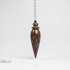 Pendule divinatoire en bois de Palmier noir ( Guyane ) Pendule Lesté - Long 6,7 cm - ø  1,9 cm - Poids 18,6 grammes
