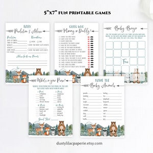 Puede incluir: Juegos de baby shower imprimibles con tem&aacute;tica de bosque. Los juegos incluyen "Baby Bingo", "Adivina qui&eacute;n: &iquest;Mam&aacute; o Pap&aacute;?", "&iquest;Qu&eacute; hay en tu bolso?", "Nombra a los animales beb&eacute;s" y "Predicci&oacute;n y consejos para beb&eacute;s". Los juegos presentan un esquema de color azul y verde con ilustraciones de un oso, un zorro, un ciervo y un mapache.