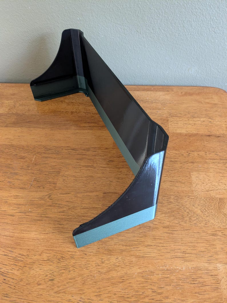 Side view of the sunshade for a Lowrance Hook2, 12-inch fish finder.