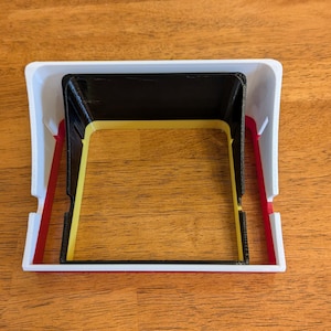 Here is a size comparison between the standard sized GoPro sunshade and the Media sized sunshade.  The two are nested in this picture - the media size is both taller and wider than the standard sized model.  This allows easy setup with the media mod.