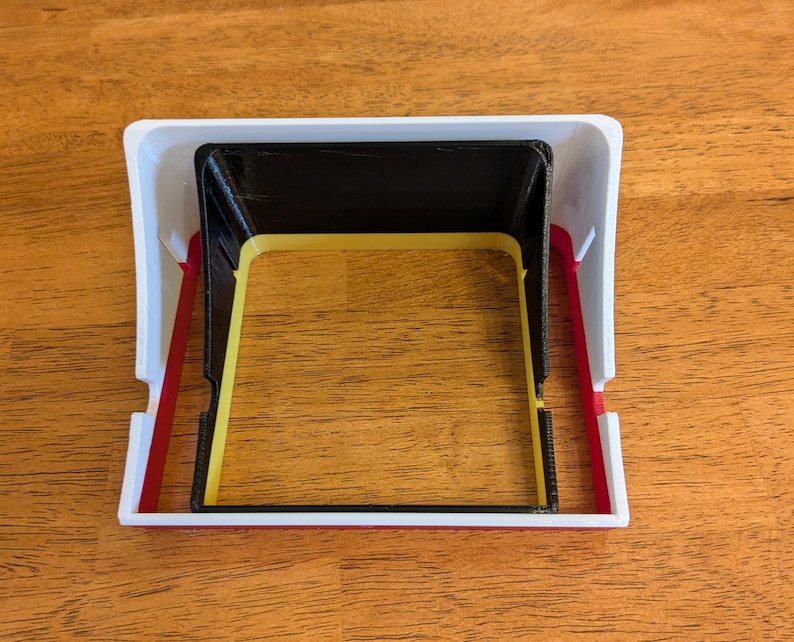 Here is a size comparison between the standard sized GoPro sunshade and the Media sized sunshade.  The two are nested in this picture - the media size is both taller and wider than the standard sized model.  This allows easy setup with the media mod.