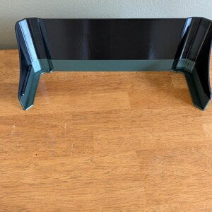 Bottom view of a customized stripe on a sunshade for a Lowrance Hook2 12-inch fish finder