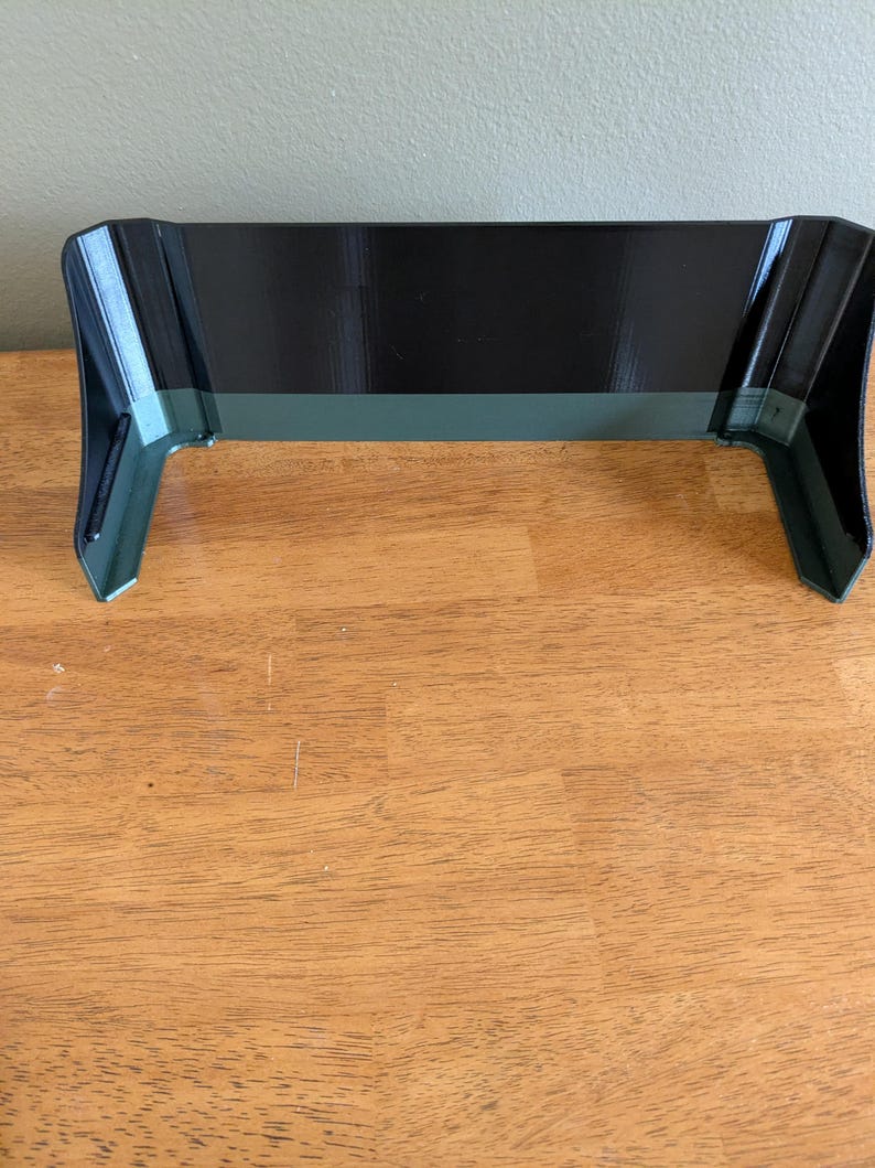 Bottom view of a customized stripe on a sunshade for a Lowrance Hook2 12-inch fish finder