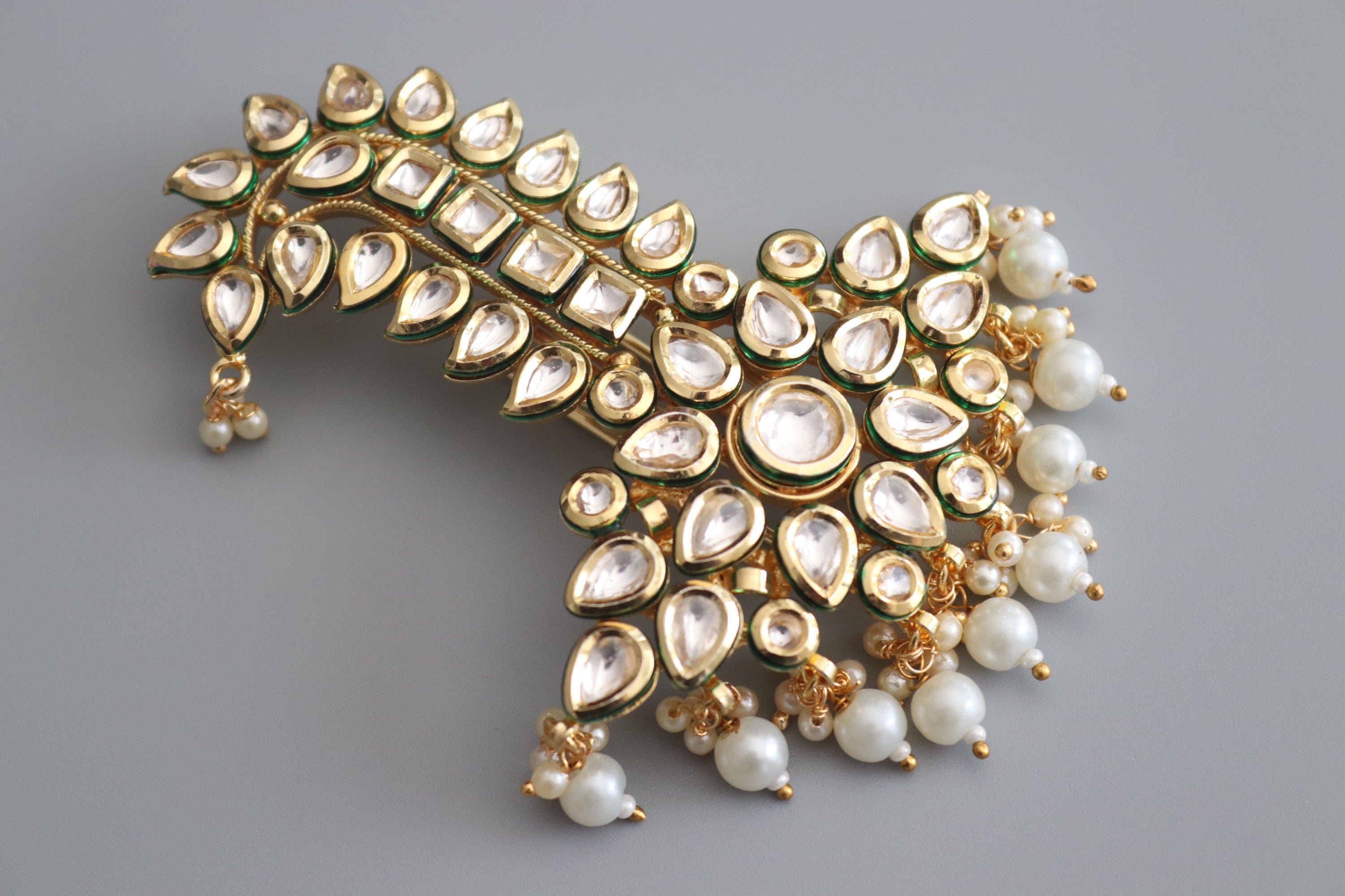Kundan brooch deals