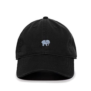 May include: A black cotton baseball cap with a small embroidered gray elephant on the front.