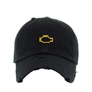 May include: A black distressed baseball cap with a yellow check engine light icon embroidered on the front.