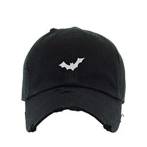May include: A black distressed baseball cap with a white embroidered bat design.