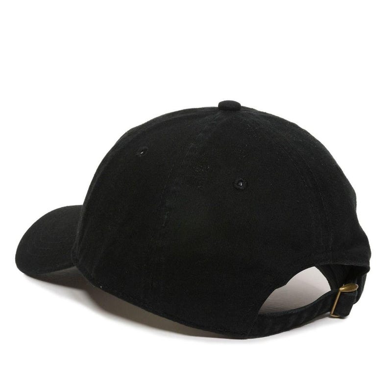 May include: A black baseball cap with a curved brim and a snap closure.