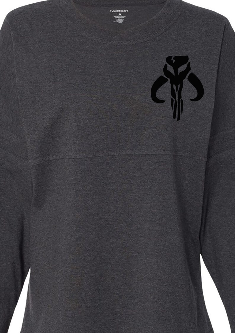 how do you remove iron on vinyl from a shirt
