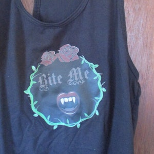 May include: Black tank top with a graphic print of a mouth with fangs and the text "Bite Me" surrounded by green vines and red roses.