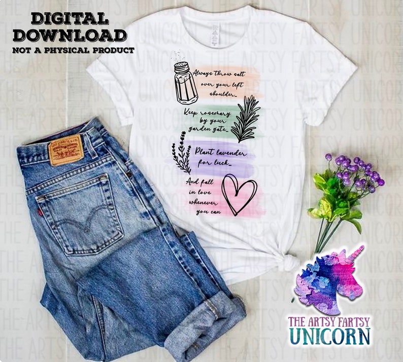 May include: White t-shirt with a watercolour background and black text that reads "Always throw salt over your left shoulder. Keep rosemary by your garden gate. Plant lavender for luck. And fall in love whenever you can." A heart is drawn in the bottom right corner.