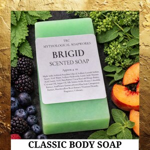 May include: A rectangular, light green bar of Brigid scented soap from Mythological Soapworks, with a white label. The label lists ingredients and the soap is approximately 4 oz. The words "Classic Body Soap" are at the bottom. Berries and herbs surround the soap.