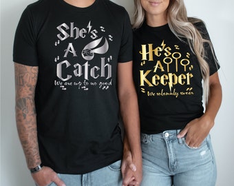 May include: Two black t-shirts with gold and silver text. The first shirt says "She's A Catch We are up to no good" with a silver snitch and footprints. The second shirt says "He's A Keeper We solemnly swear" with gold wands and footprints.