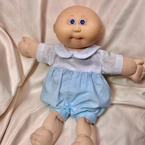 Cabbage Patch Baldie with blue eyes doll