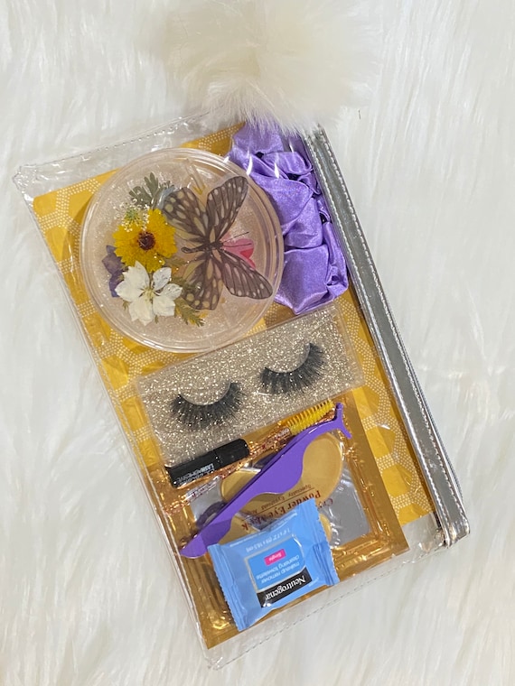 3 pair false lash holder box made of resin with pressed flowers w/ lash kit in matching colors & zippered plastic bag w/ coordinating puff