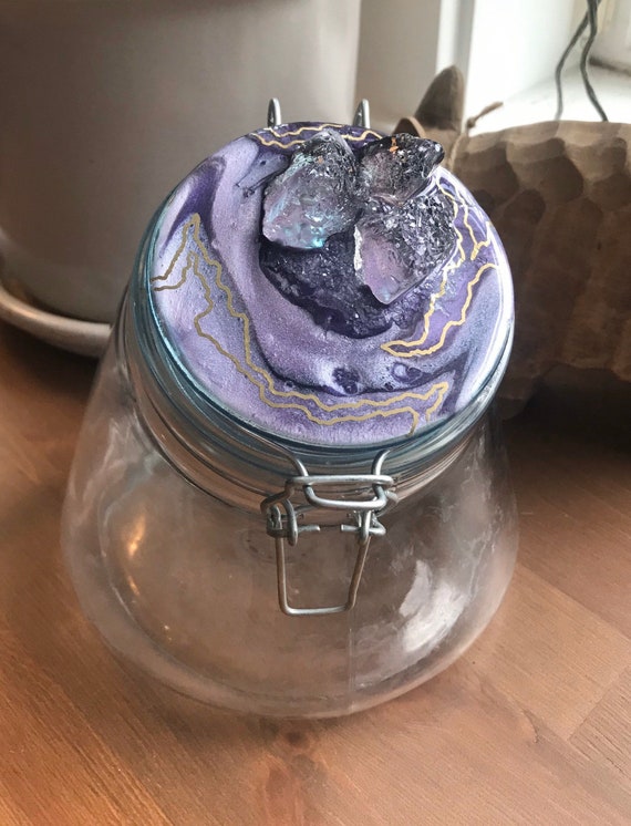 7inch curved ball glass cookie jar with geode in purples and gold accented with fire glass and glass glitter