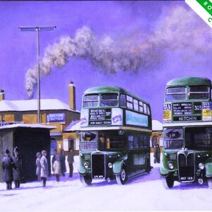 May include: A painting of two green double-decker buses in a snowy town square. One bus displays Hitchin on its front sign. People stand near a small station building under a purple sky. A green banner in the corner reads Rothbury Cards Christmas.