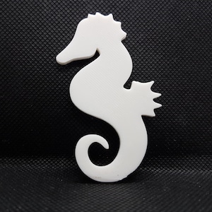 A quality 3d printed seahorse, could be used as a jewelry base or decoration