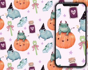 May include: A phone wallpaper featuring a repeating pattern of frogs wearing witch hats sitting on pumpkins with a purple potion bottle, a wand, and stars on a light pink background. The text "nimbob" is at the bottom of the image.