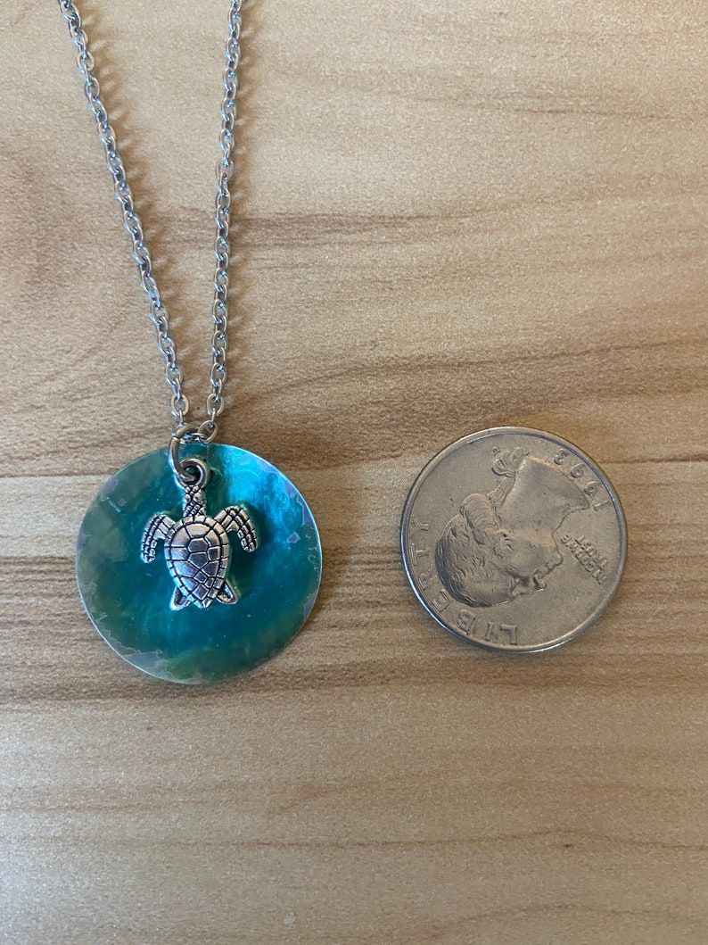 Coin shell and turtle charm necklace
