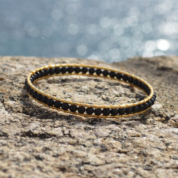 Solid black onyx bangle best sale bracelet