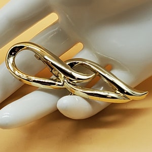 vintage gold tone double ribbon loop brooch